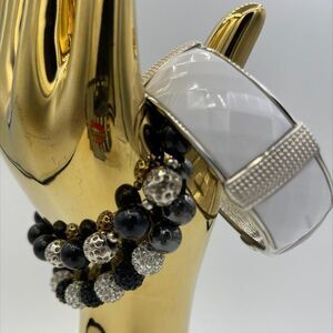 3 piece bracelet bundle in silver tones, black and white,1 cuff, 2 stretch ,EUC